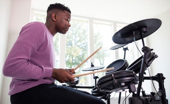 Student playing drums