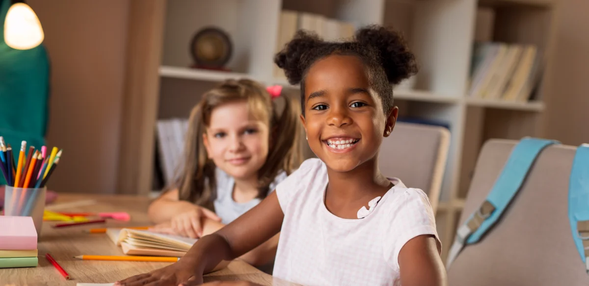 Two elementary students doing homework together