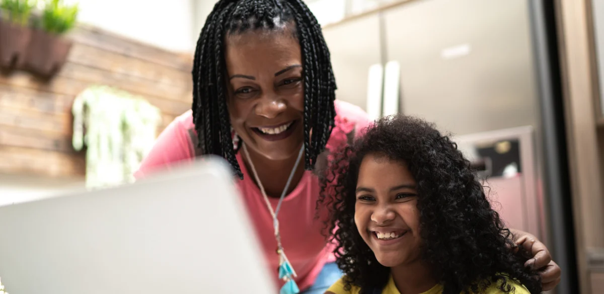 teacher and student smiling